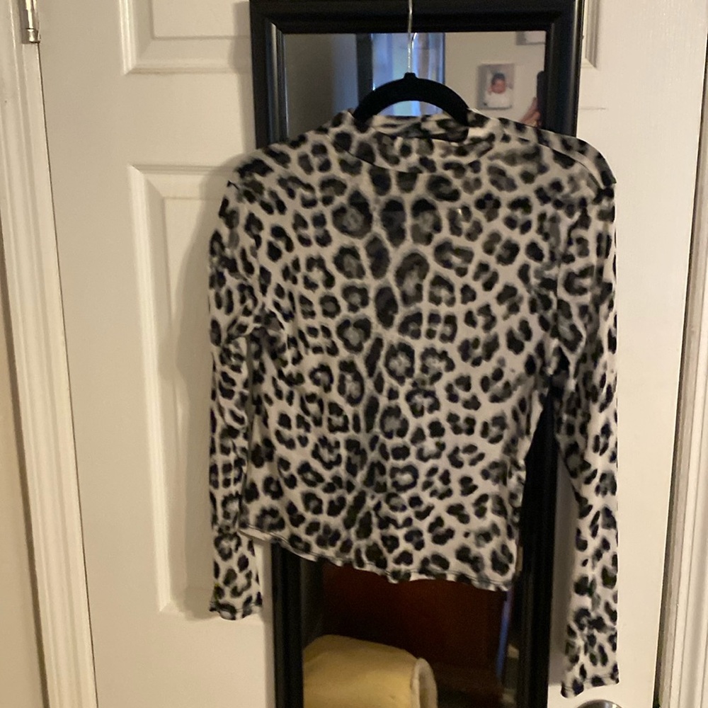 Snow leopard print mesh mock neck top